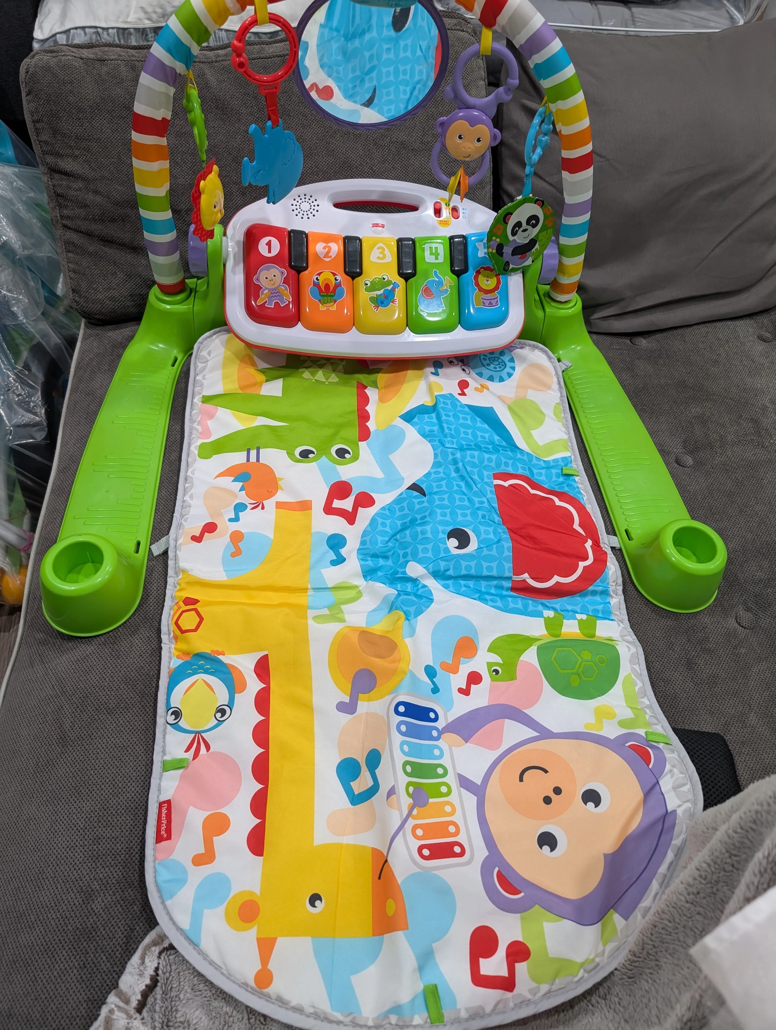 Fisher price kick and play piano gym